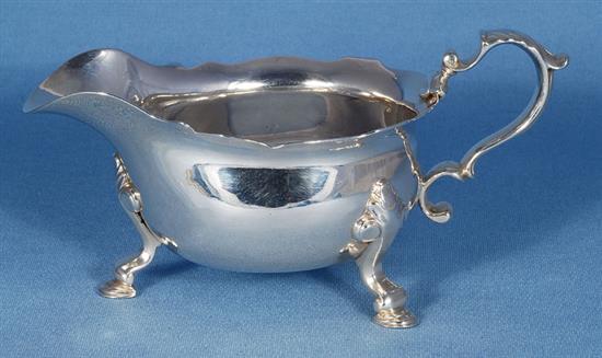 A pair of George II silver sauce boats, attributed to Joseph Sanders, length 195mm, weight 24.4 oz/760grms.